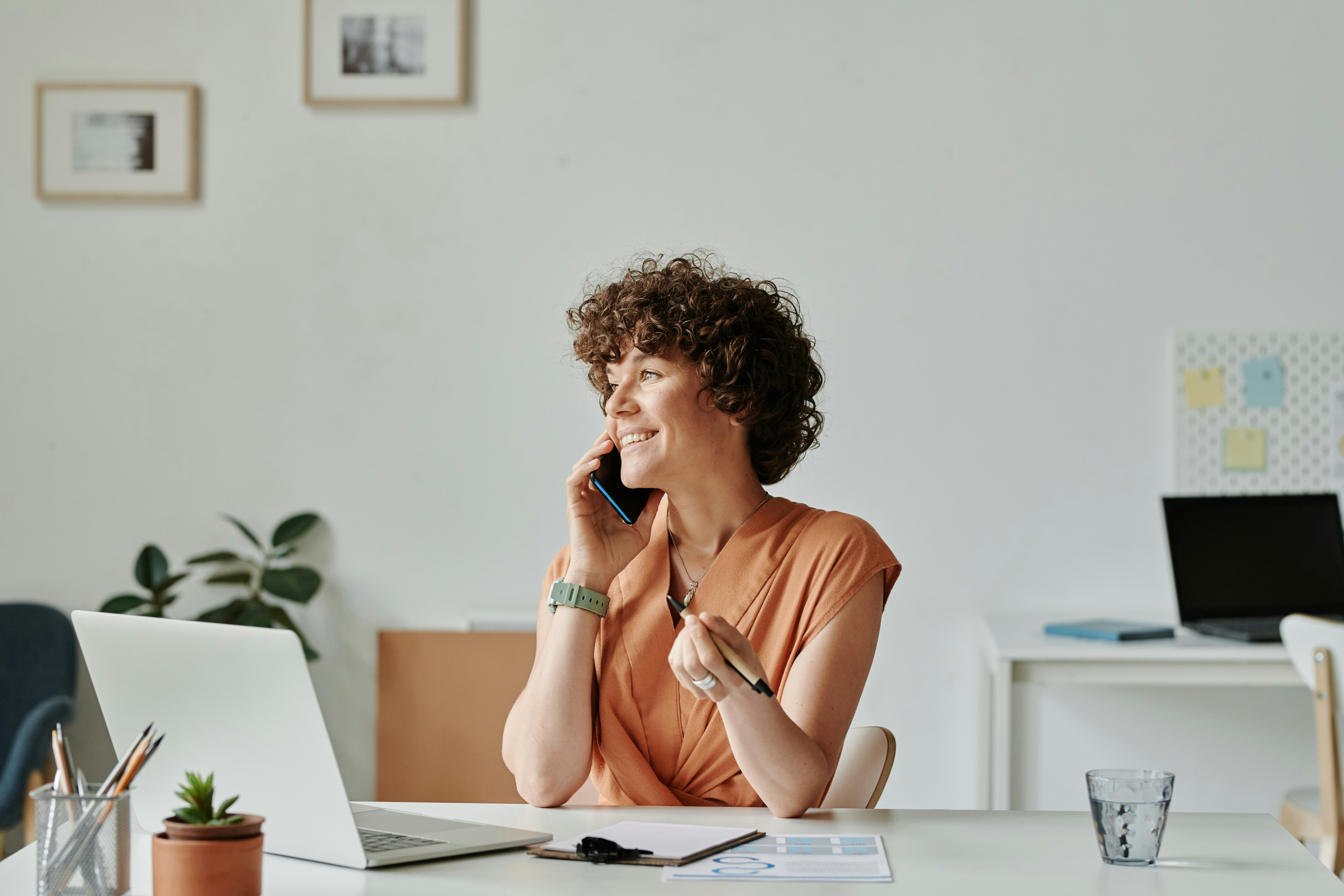 A professional in their office enjoying work without feeling anxious.