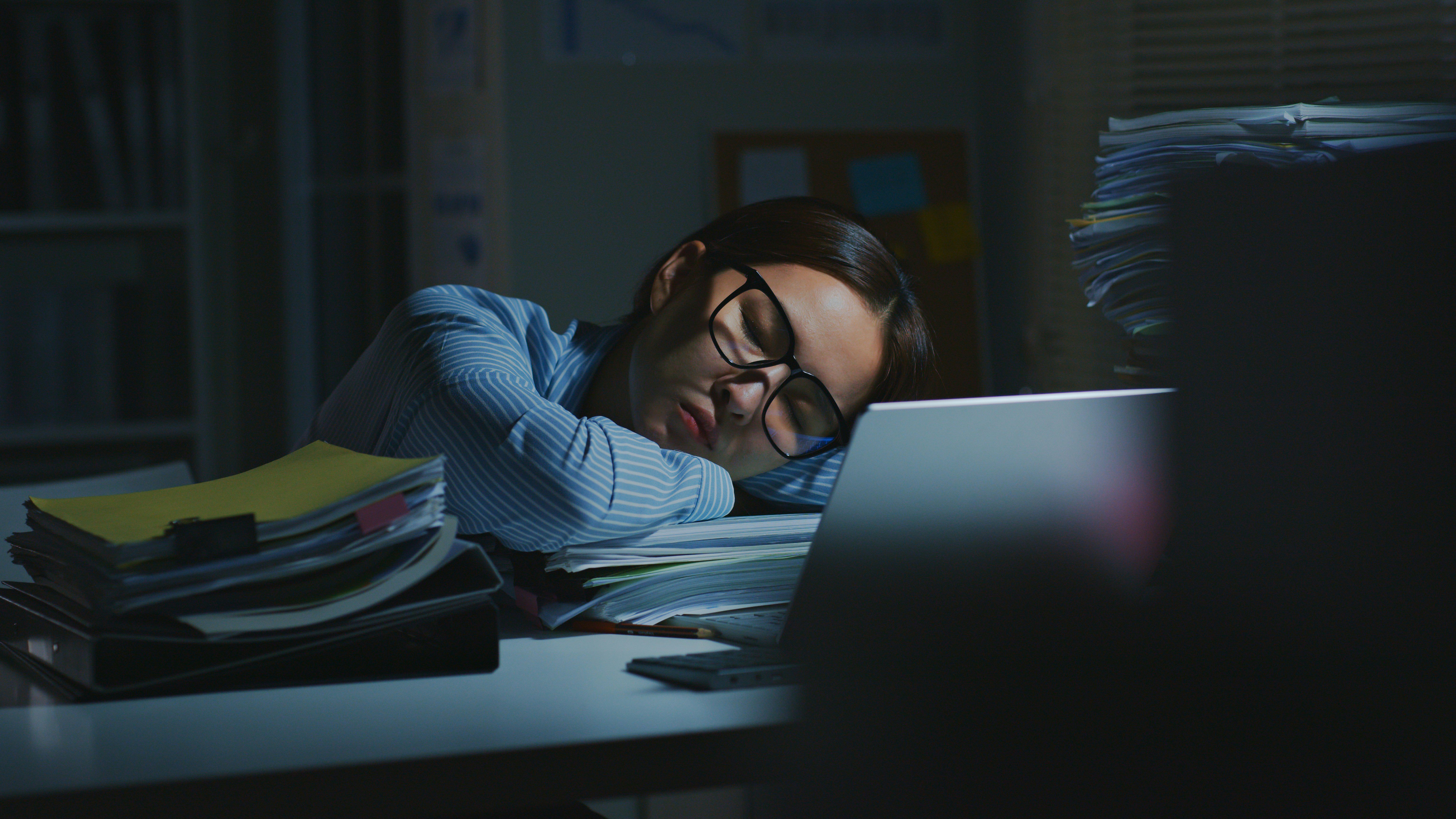A person struggles with work due to chronic insomnia