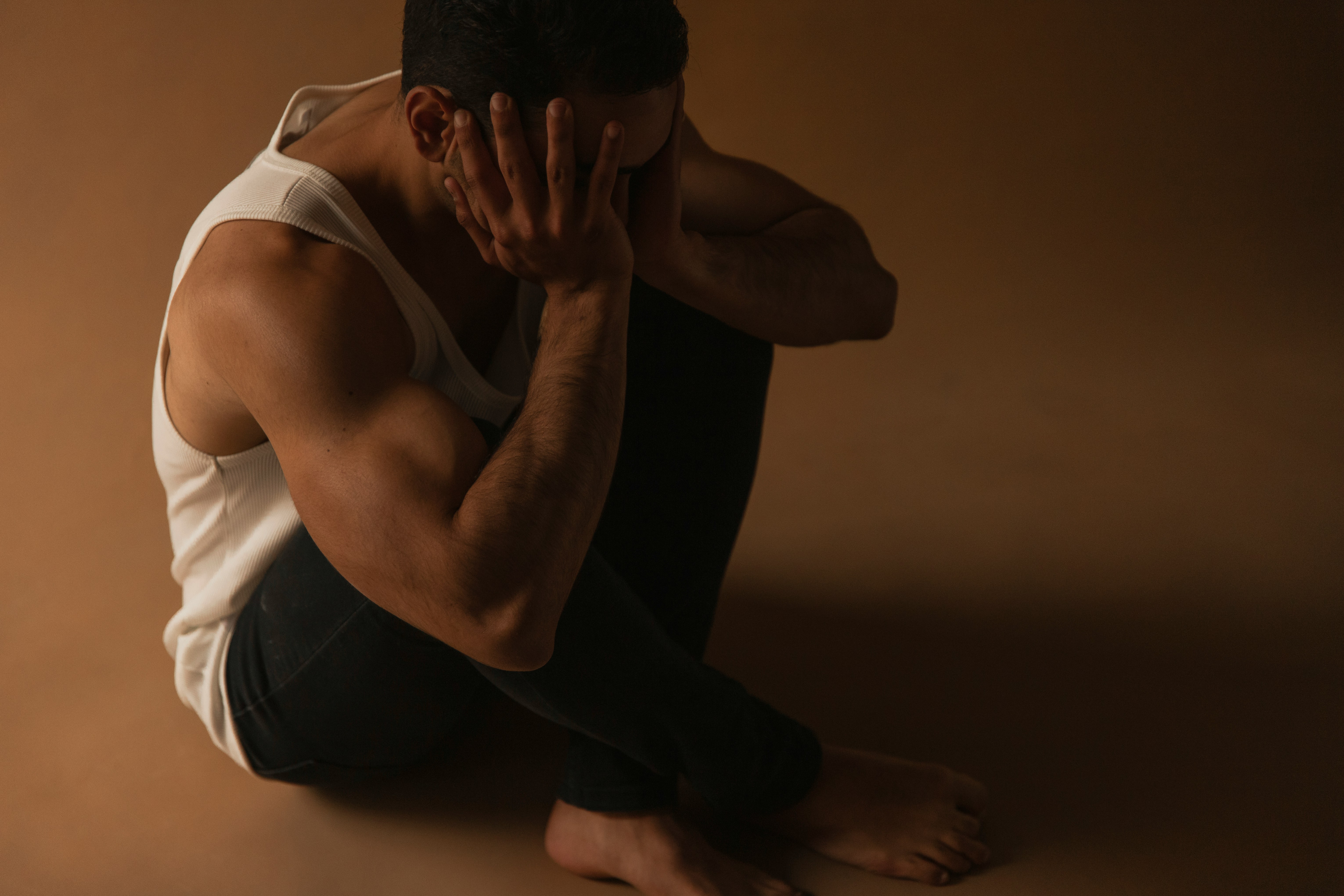 A man experiencing stress and trauma response.