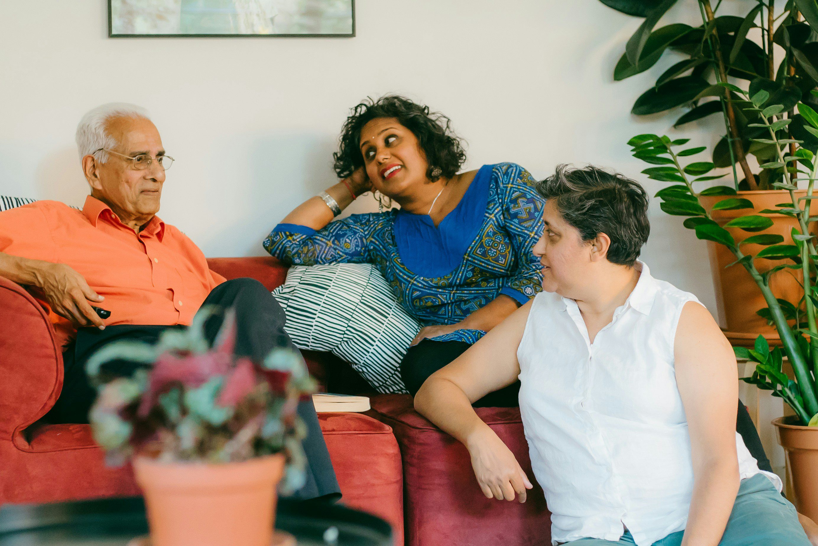 A south Asian family in conversation, representing intergenerational relationships and mental health