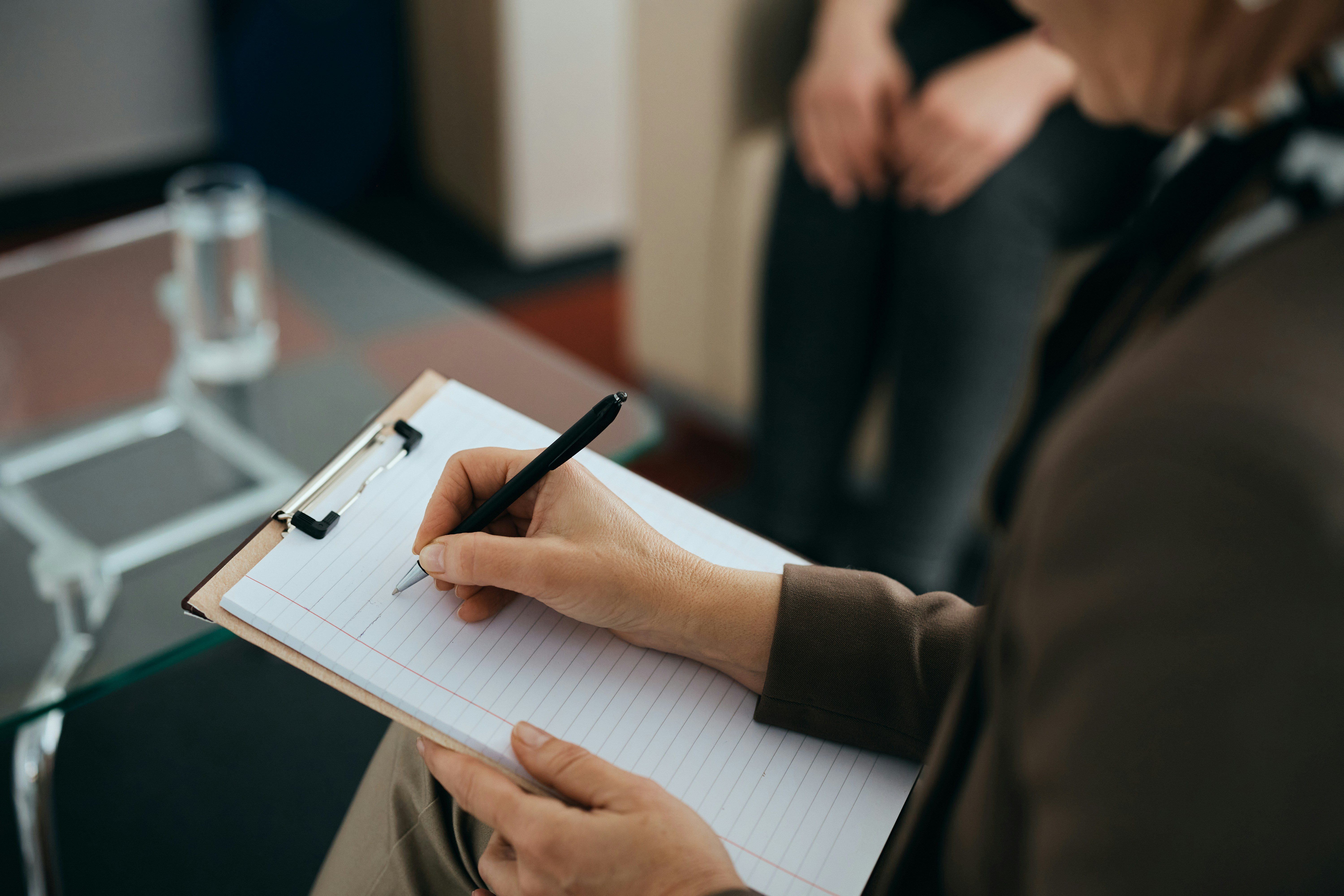 A Muslim psychologist in Ontario prepares for a therapy session.